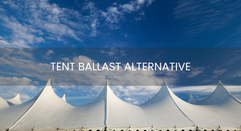 Blue sky and the top of white tents for an event