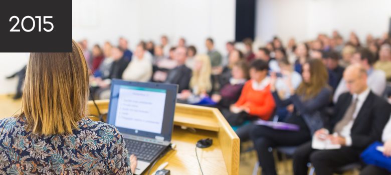 Speaker presenting to an audience