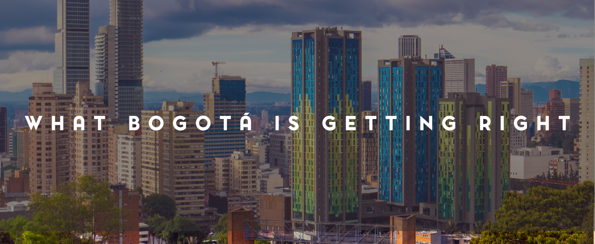 A city scape of buildings Text: What Bogotá Is Getting Right