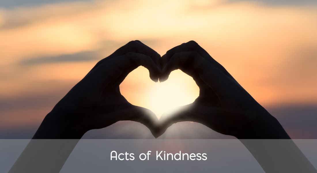 Sunset background with two hands making a heart Text: Acts of Kindness