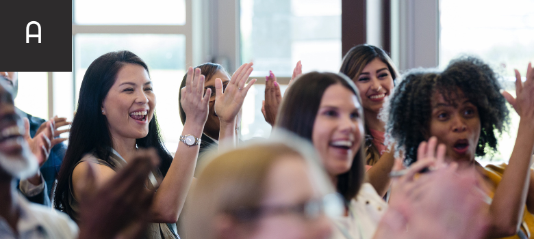 An audience clapping